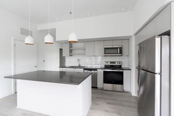 Henley Place Apartments in Milwaukie, Oregon Model Kitchen with Island